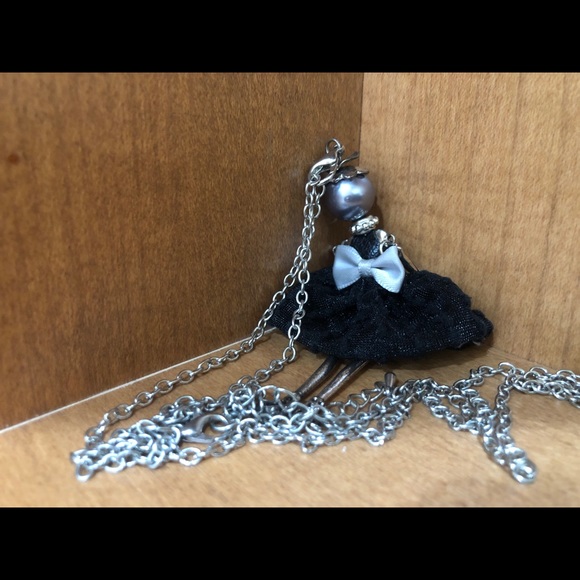 Statement Doll Necklace with Bow - Picture 5 of 6